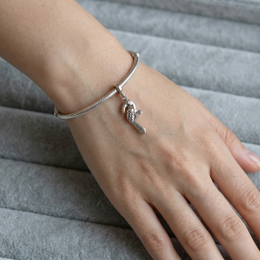 Charm Tucán Plateado