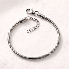 Pulsera flexible plateada ajustable (REGALO)